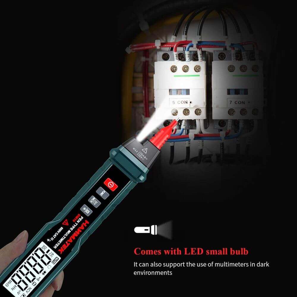 Digital multimeter with LED light testing electrical wires in a dimly lit panel