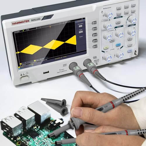 Hand using oscilloscope probe to measure voltage on circuit board, oscilloscope display active