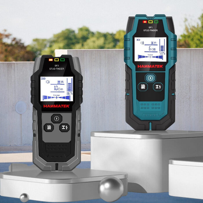 Digital stud finders with LCD screens on display blocks, used for wall scanning and electrical testing