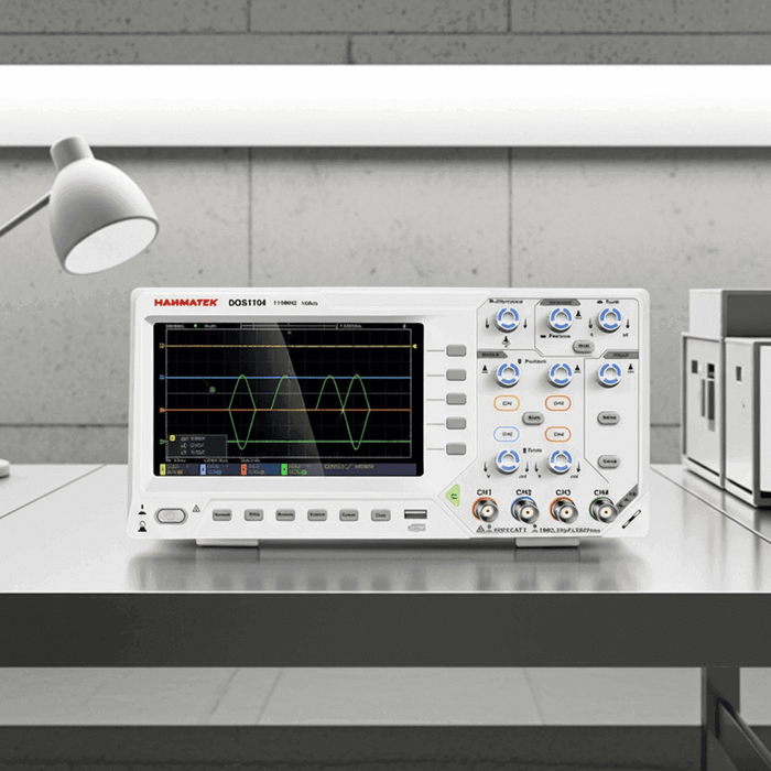 Hanmatek DOS1104 4-channel digital oscilloscope displayed on a desk for multi-signal analysis.