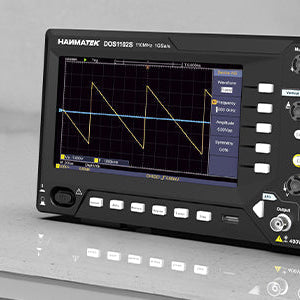 Oscilloscope displayed on a workbench with settings and waveforms visible, ideal for electronics analysis.