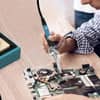 Professional soldering stations featuring the SD2 model with digital display for precise electronics repair