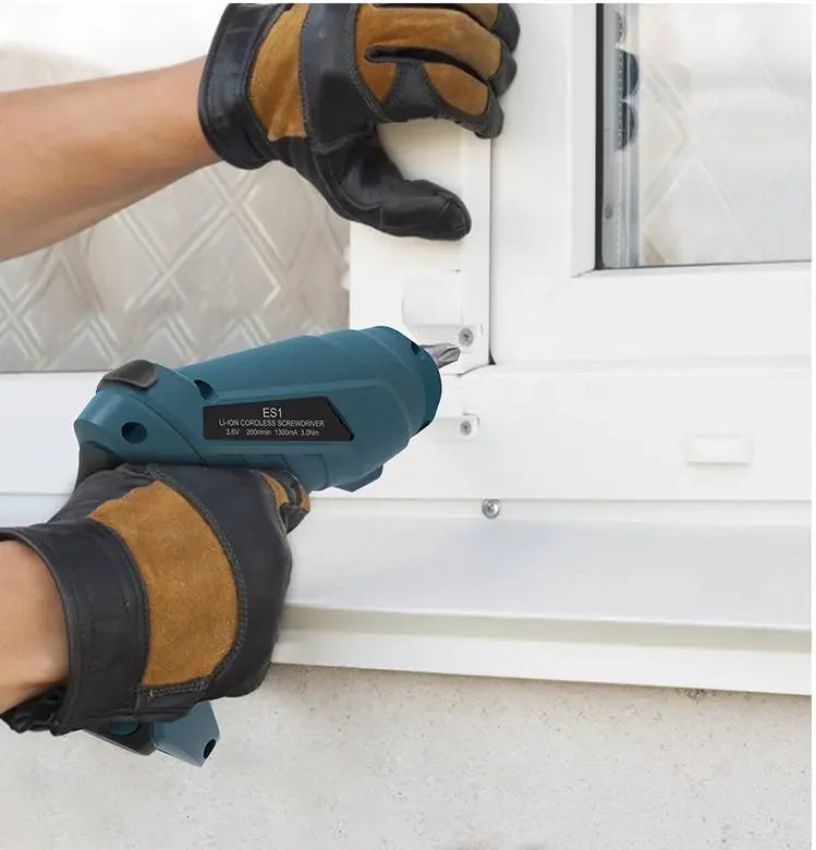 Hands using a cordless electric drill screwdriver to install a window frame with precision and ease