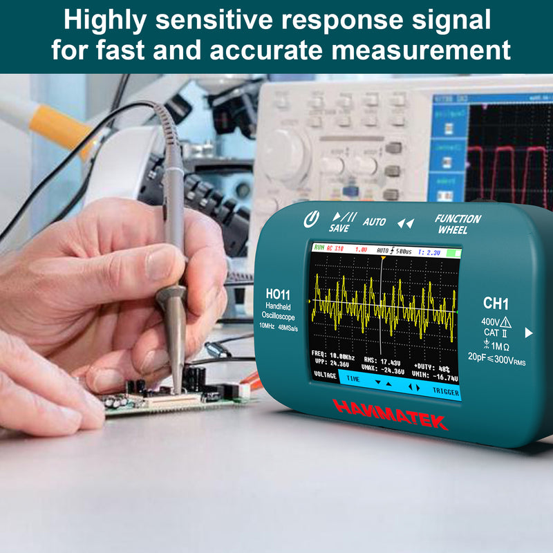 Hanmatek oscilloscope ho11 displaying a waveform with a hand holding a probe in a technical setting.