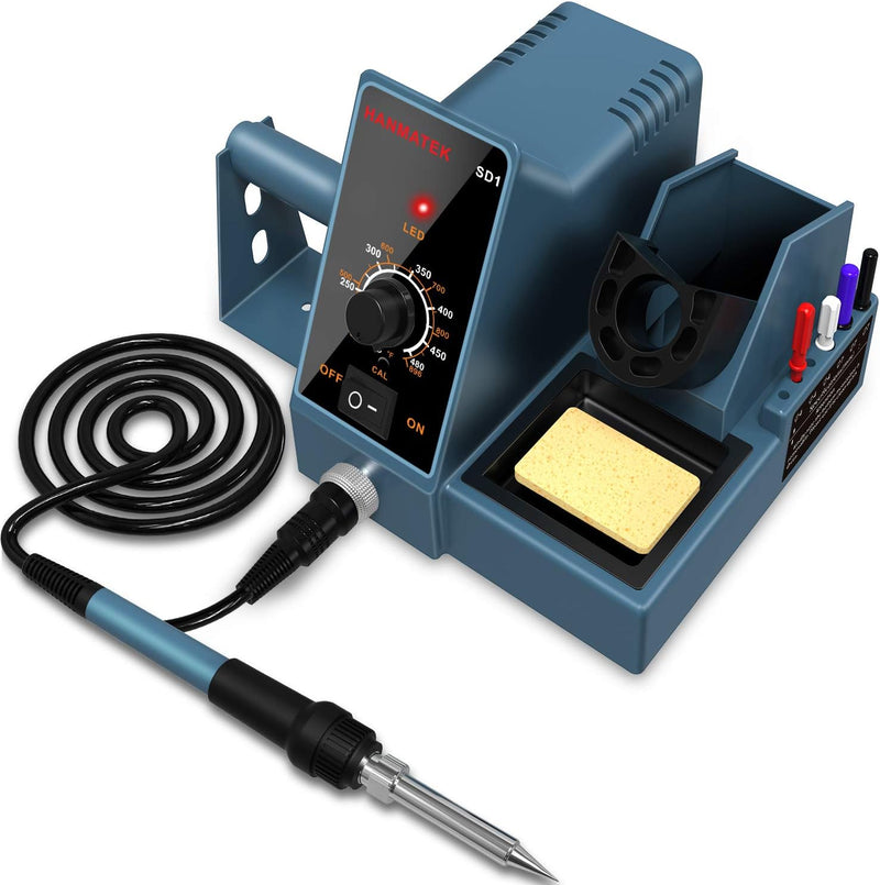 Soldering station with soldering iron, cable, and accessories on a white background